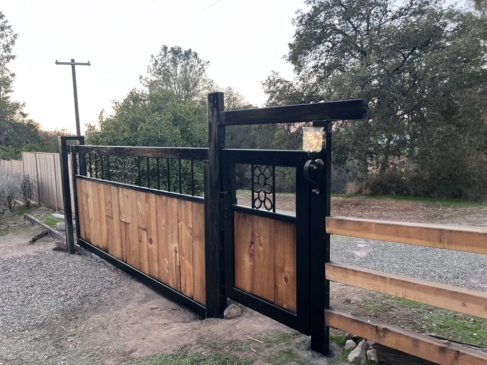 Custom black gate with wood inlay